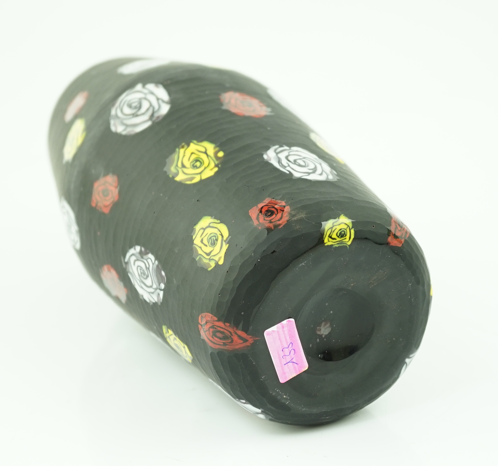 Vittorio Ferro (1932-2012) A Murano glass Murrine vase, the black ground with white, red and yellow flower heads, unsigned, 28cm., Please note this lot attracts an additional import tax of 20% on the hammer price